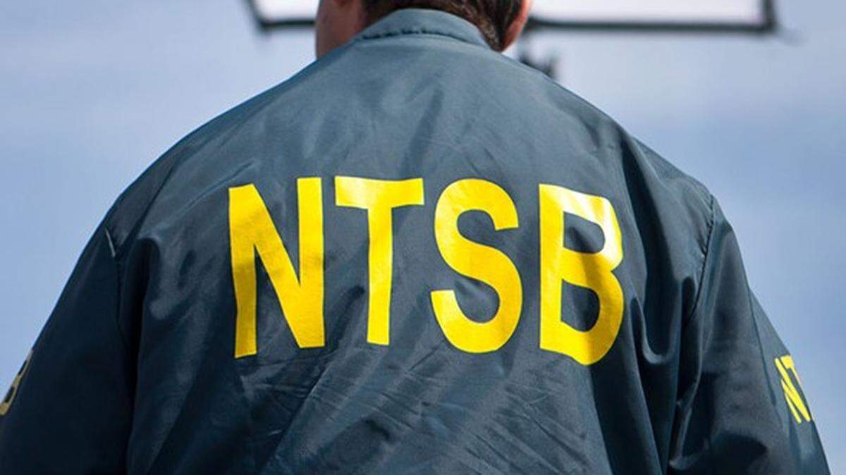 An official with the National Transportation Safety Board said the deadly crash that killed five people and released toxic chemical into the air in Effingham County may have been caused when a driver tried to pass the tanker on the highway.