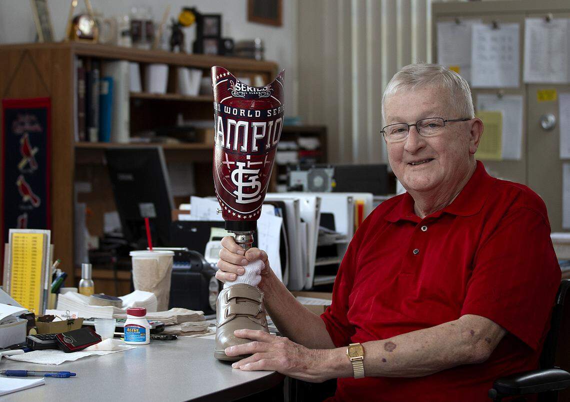 Former St. Clair County Board Member Frank “F.X.” Heiligenstein poses with his St. Louis Cardinals-themed prosthetic leg. Heiligenstein had his leg amputated because of complications with diabetes.