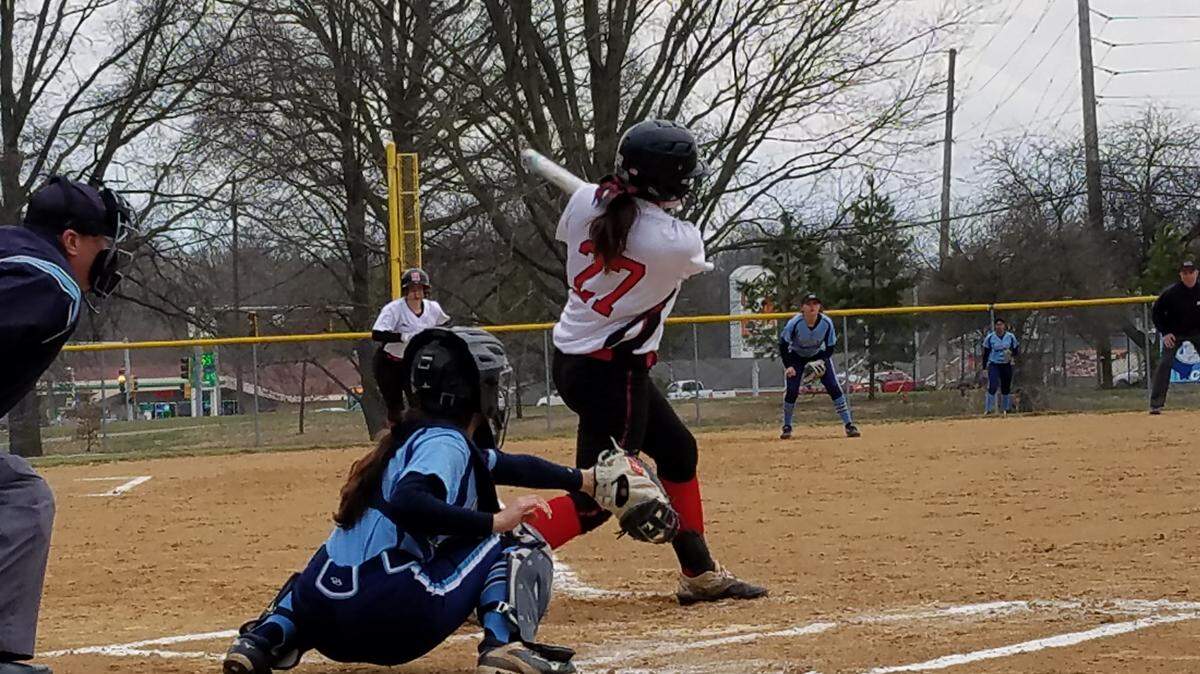 Highland’s Carrie Mettler takes a hack during a recent game against Belleville East. On Wednesday, Mettler notched three hits, a triple, two RBIs, and two runs scored in helping lead the Lady Bulldogs past Althoff 11-5.