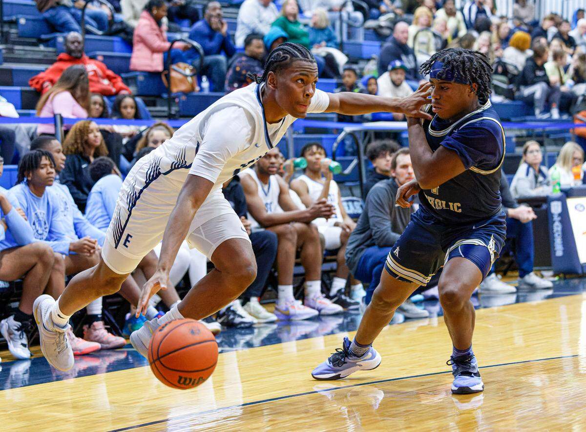 Belleville East’s Jordan Pickett drive the baseline during Tuesday’s non-conference game against Althoff. The Lancers ultimately posted a 78-50 victory.