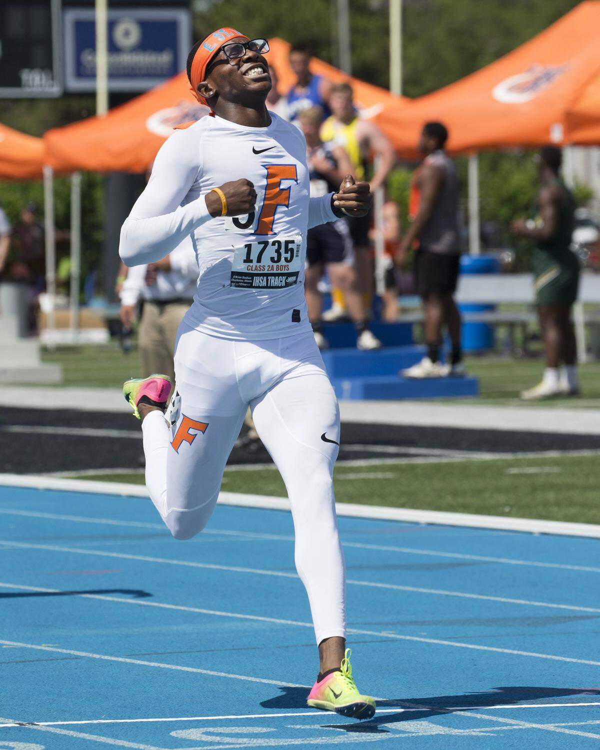 East St. Louis’ Willie Johnson wins the Class 2A 400-meter cash at the IHSA Track and Field State Finals on Saturday. [Photo: Chris Johns]
