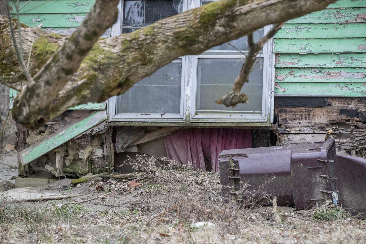 A condemned vacant home in the 8500 block of Belleview Avenue in Centreville shows the damage water has done on the property.