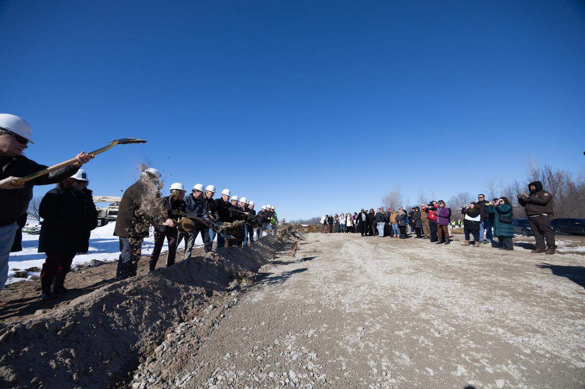 Members of local government and the construction company Wright Construction Services, Inc. commence a groundbreaking for a new county animal control building in Belleville, Ill. on Jan. 16, 2025.