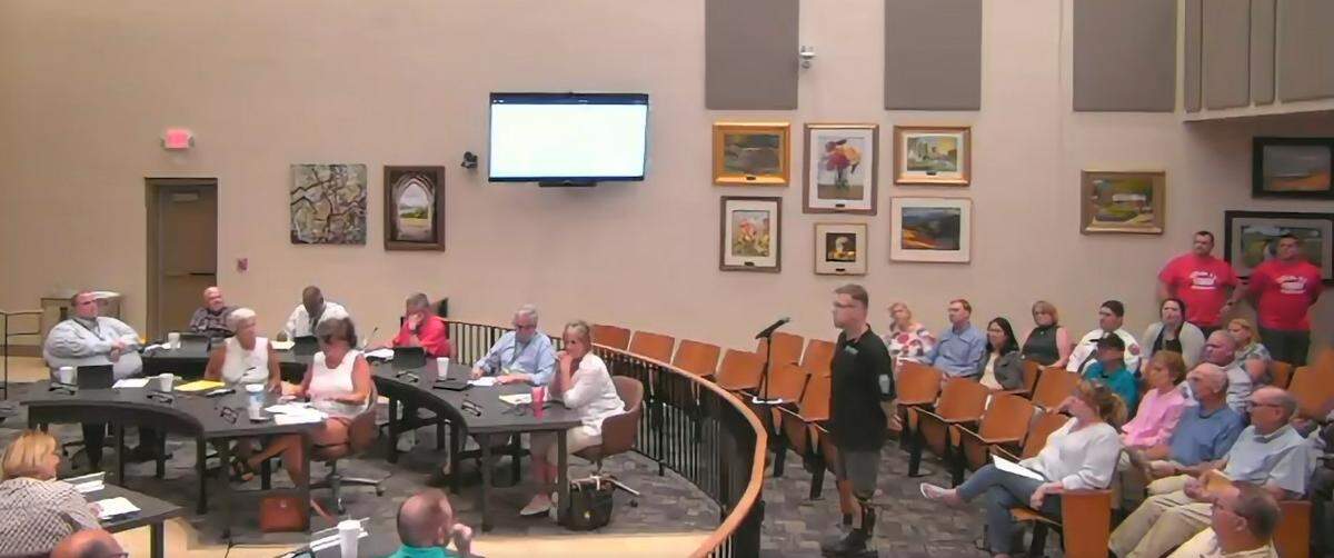Jason Wilson, owner of Integrity Tattoos in Belleville, addresses the City Council at its meeting last week. He spoke in favor of changing an ordinance to allow a tattoo parlor in downtown Belleville. Aldermen voted to allow two.