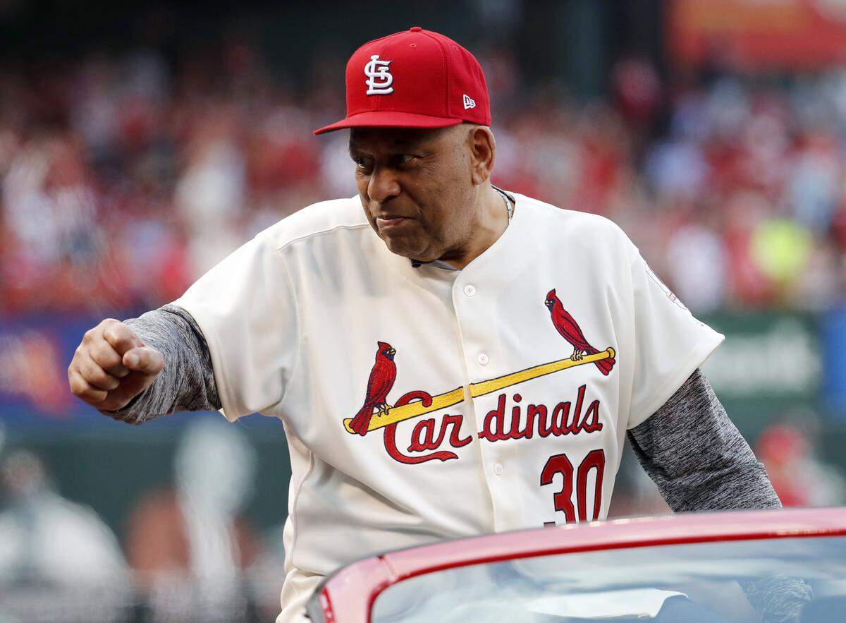 Orlando Cepeda waves to Busch Stadium fans during a 50th anniversary celebration of the 1967 World Series championship.
