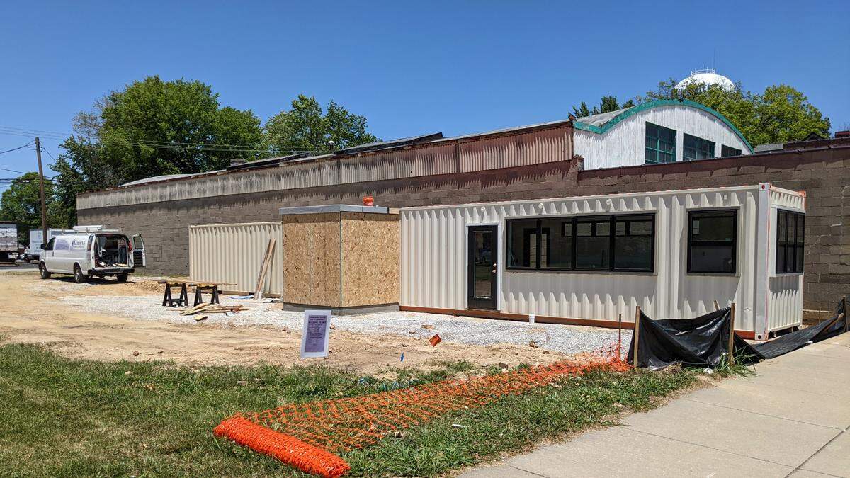 The Uptown Scoops frozen custard shop structure is being built from a repurposed shipping container.