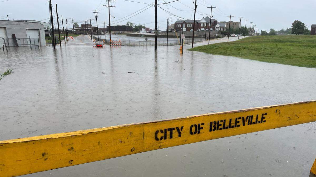 A Belleville road flooded Tuesday because of heavy rainfall. The flood warnings for St. Clair and Madison counties have expired, the National Weather Service of St. Louis confirmed.