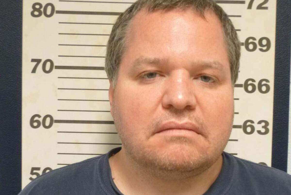 Booking photo of former St. Clair County Circuit Judge Michael Cook of Belleville.
