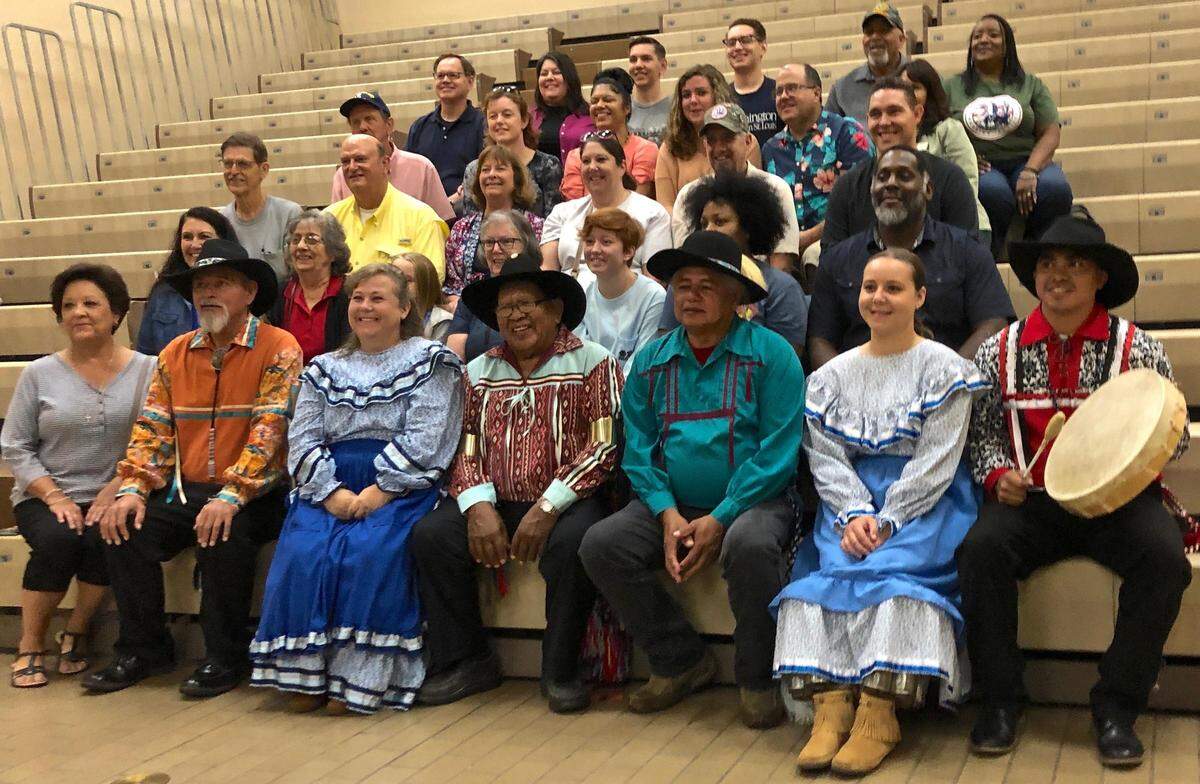 After performing at Cahokia Mounds, members of the Chickasaw Nation Dance Troupe pose with descendants of the Chickasaw Tribe who live in the St. Louis area.