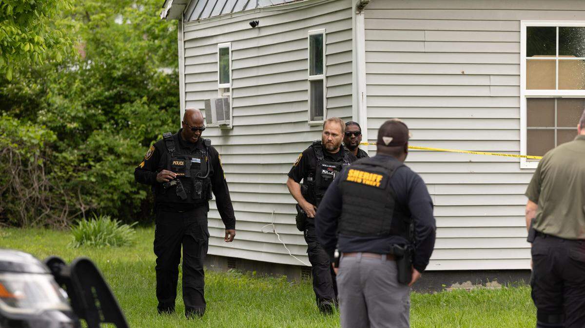 Officers patrol property in Cahokia Heights after a person was shot Monday.