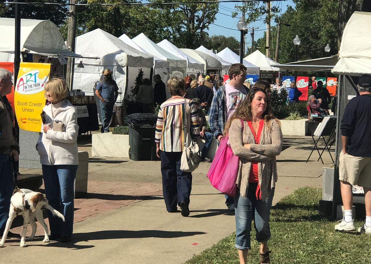 Community members take in the atmosphere at the 16th annual Art in the Park event in October 2019 in Highland. This year’s event is slated for 10 a.m. to 5 p.m. Saturday, Oct. 8, and 11 a.m. to 4 p.m. Sunday, Oct. 9, at Lindendale Park.