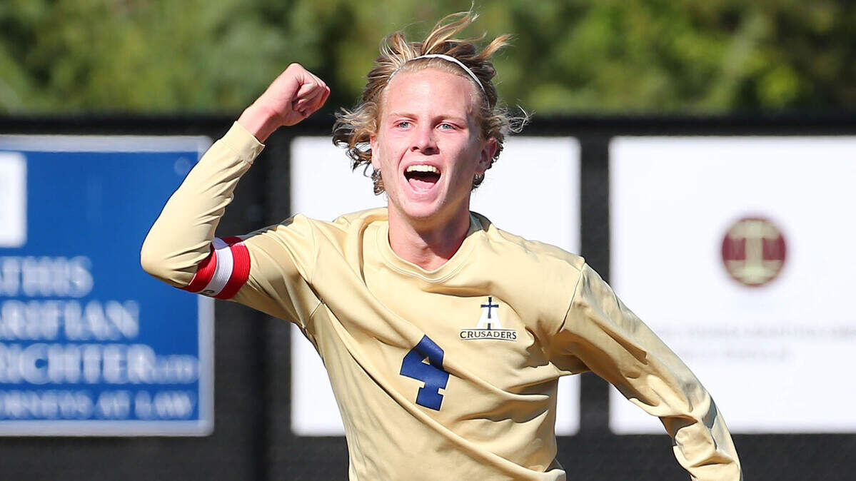 Althoff’s Mitchell Kidd celebrates after scoring against Father McGivney at the class 1A sectional championship game Saturday.
