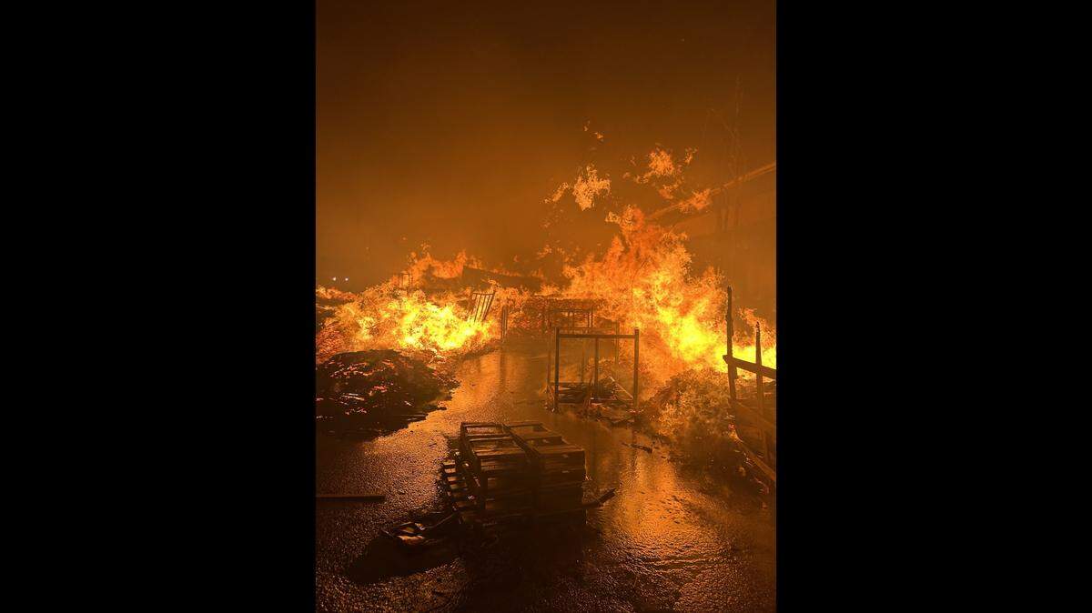 Firefighter responded to a fire at a pallet company in East St. Louis Tuesday. No injuries were reported.