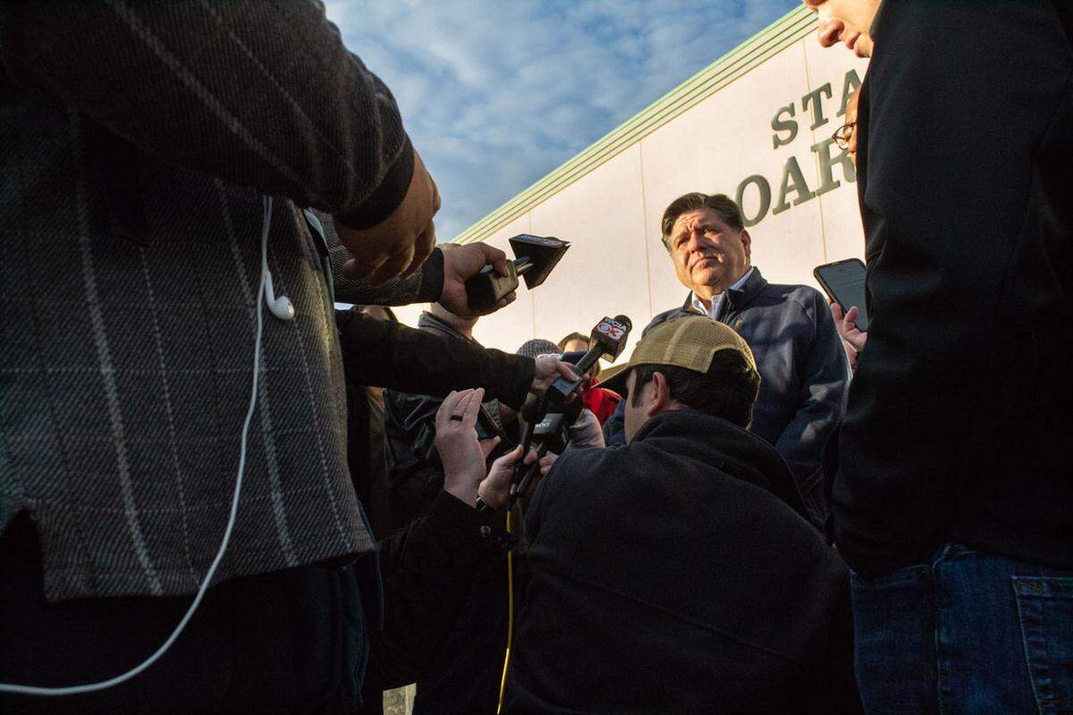 Gov. JB Pritzker takes reporters’ questions outside the Illinois State Board of Elections building in Springfield on Oct. 27, 2025.