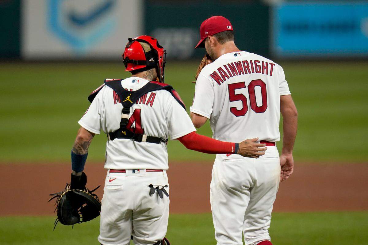 St. Louis Cardinals veterans Yadier Molina and Adam Wainwright would be highly coveted by contending teams at the upcoming trade deadline — imagine either or both reunited with Tony LaRussa in Chicago — but if neither chose to leave this past offseason, it’s hard to imagine either would pursue a path out of St. Louis now.