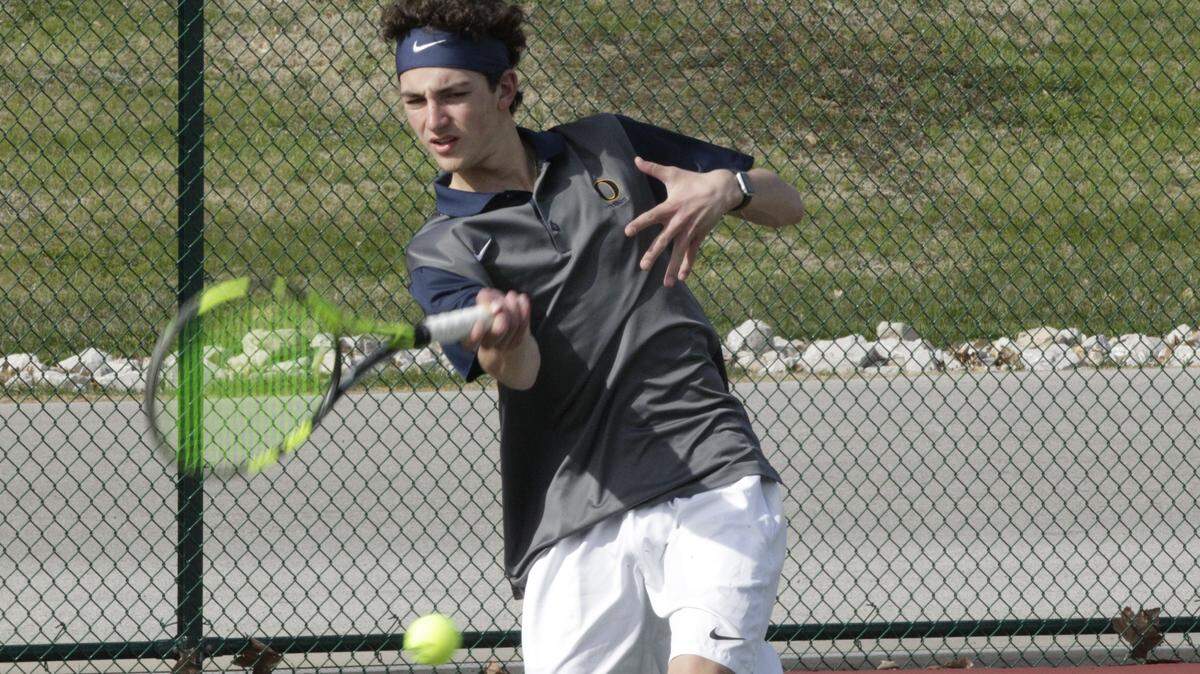 Niko Papachrisanthou plays a shot in a match earlier this year at Collinsville. Papachrisanthou was 3-1 in singles play at the Belleville East Tournament.
