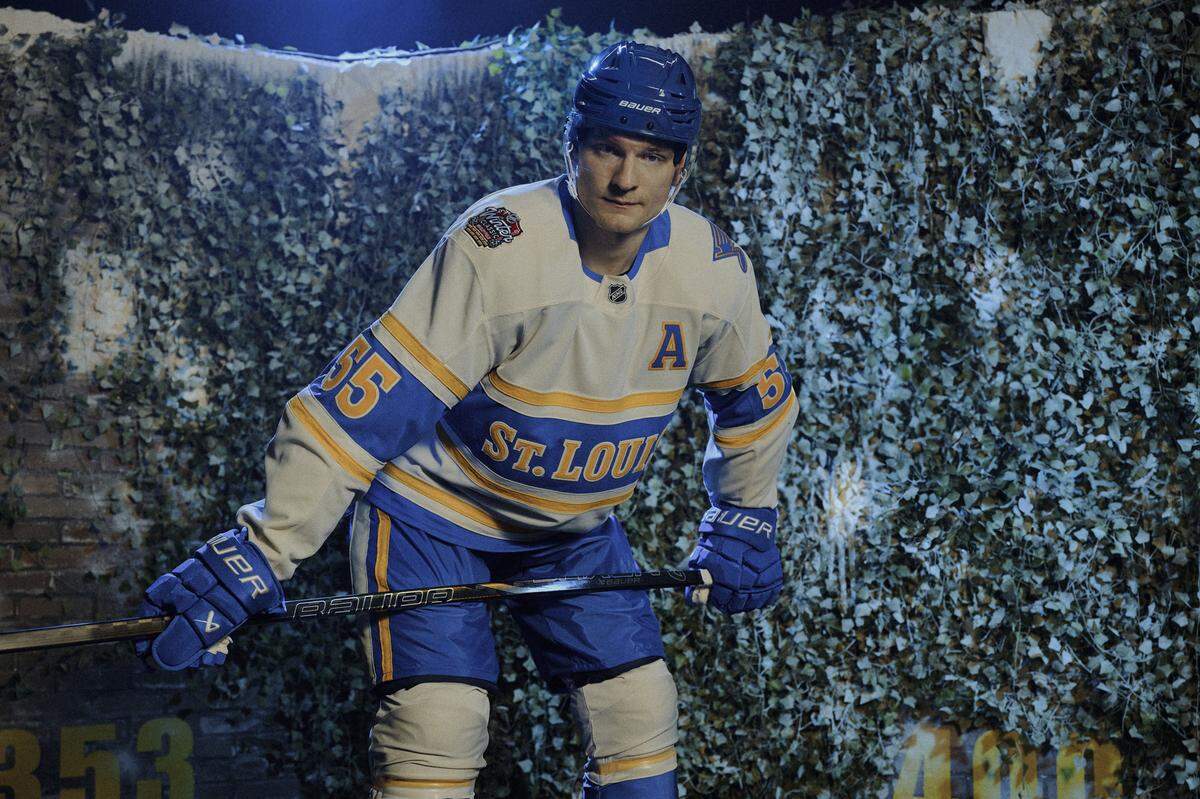 St. Louis Blues Captain Colten Parayko models the uniform the team will wear when it takes on the Chicago Blackhawks in the Discover NHL Winter Classic at Wrigley Field on Dec. 31.