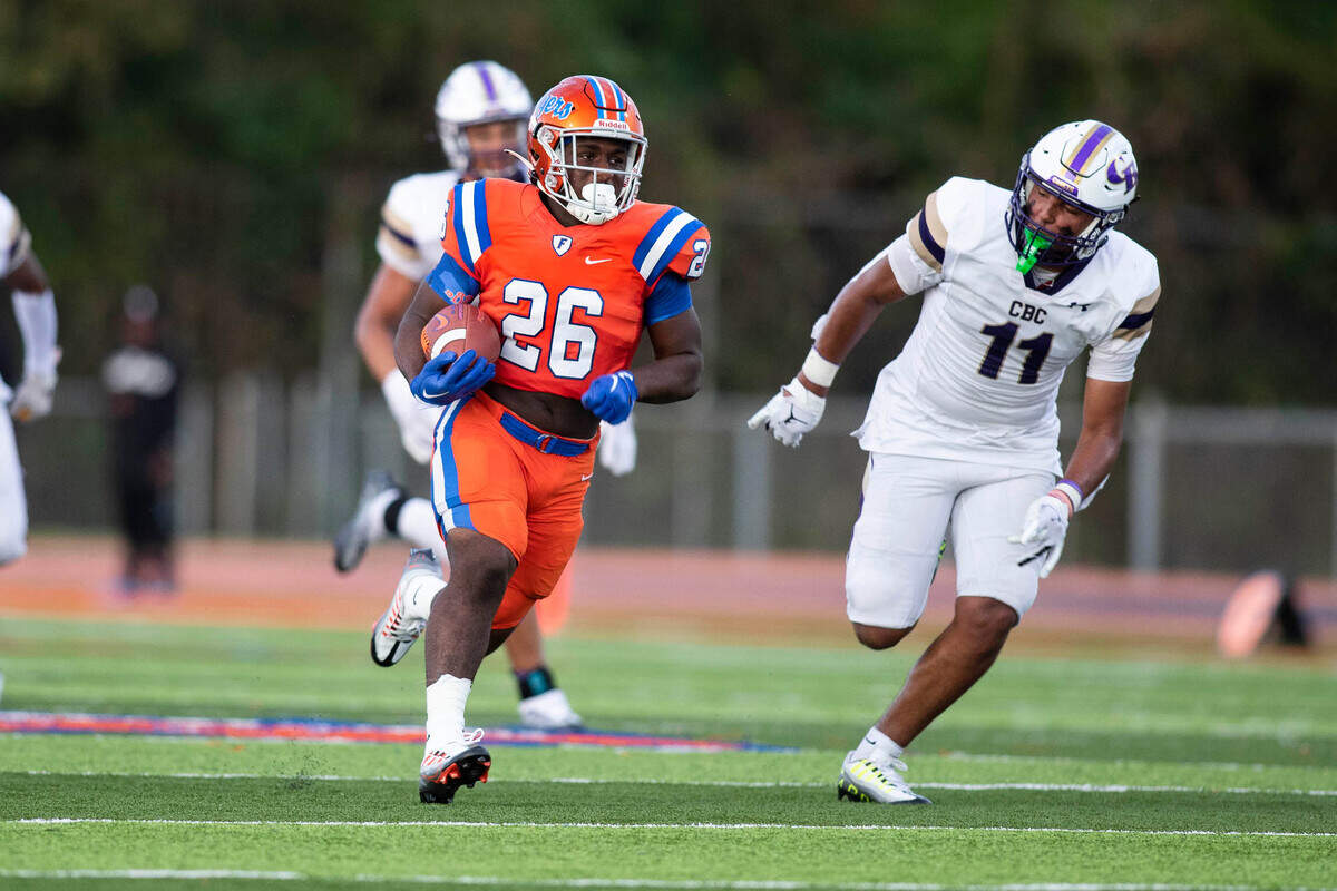 September 3, 2022 - East St. Louis, IL - East St. Louis running-back Larevious Woods carries the ball for a touchdown during the annual Gateway Scholars Football Classic football game between CBC and East St. Louis. The Flyers went on to a 64 to 19 win. [Photo: Chris Johns]
