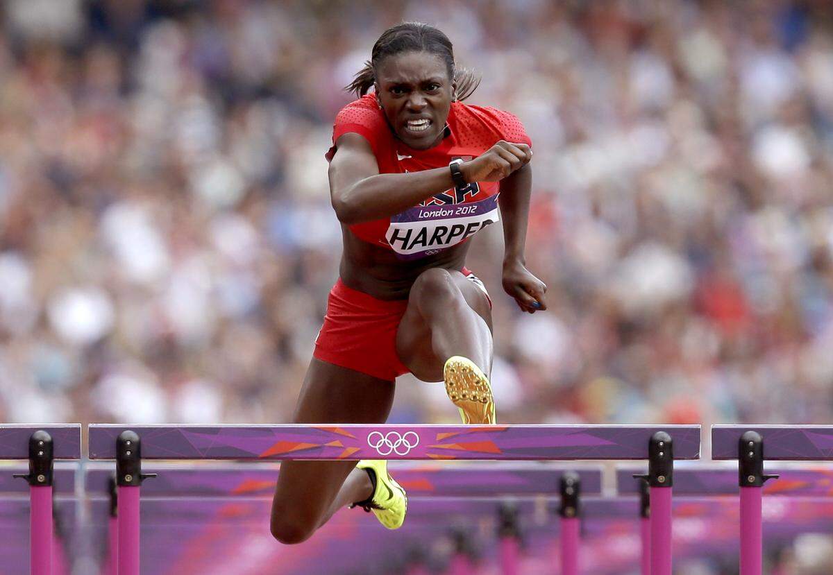 United States’ Dawn Harper competes in a women’s 100-meter hurdles heat during the athletics in the Olympic Stadium at the 2012 Summer Olympics, London, Monday, Aug. 6, 2012. (AP Photo/Anja Niedringhaus)