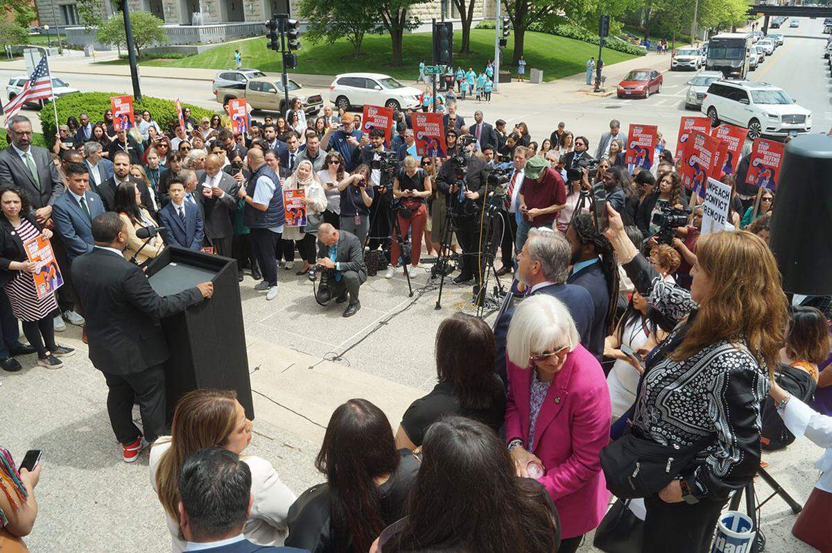 Democratic State Senator Willie Preston, D-Chicago, criticizes DHS Secretary Kristi Noem during a rally at the Statehouse immediately following Noem’s news conference.