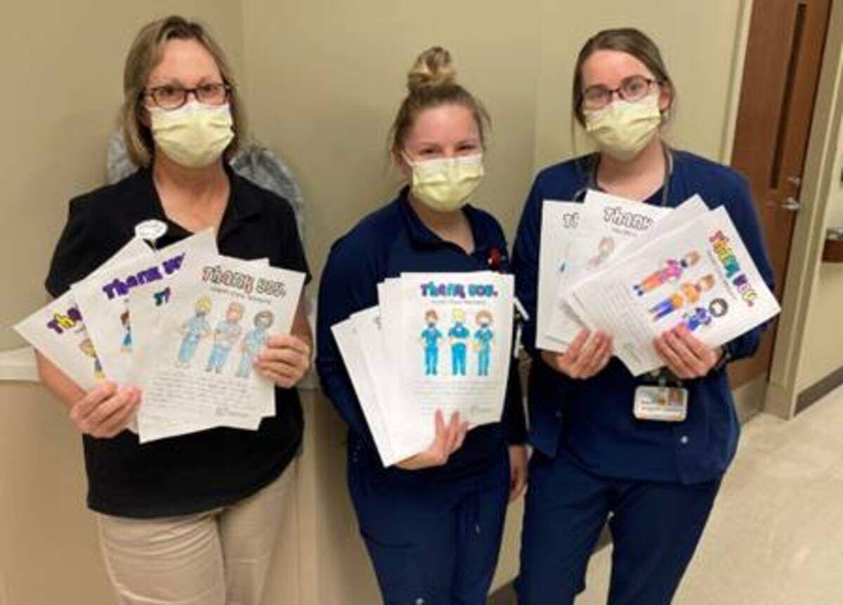 HSHS St. Joseph’s Hospital Highland partnered with Highland Primary School and St. Paul Catholic School to invite students to color and write notes of encouragement and thanks to hospital staff. Hospital colleagues were overjoyed to read the notes they received. From left, Carolyn Embolden, physical therapist assistant; Lyndsey Gelly, RN; and Megan Buller, RN. For more information about HSHS St. Joseph’s Hospital Highland, visit the hospital’s website at stjosephshighland.org.