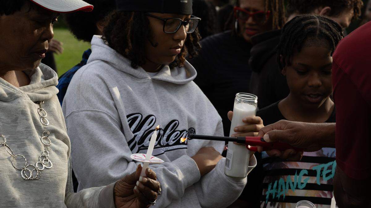 Friends and family of 13-year-old Jermel Ware, who died after a go-cart crash, held a candlelight vigil for Jermel in Belleville’s Jaycee Park Friday night.