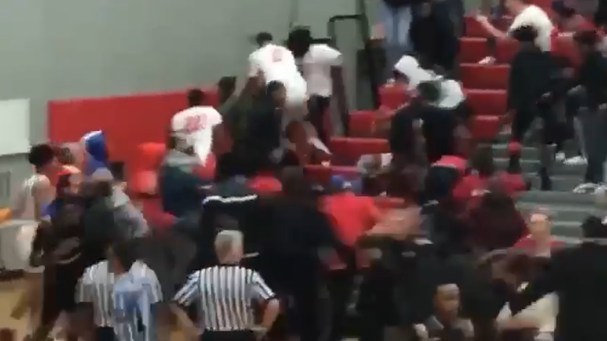 A frame taken from video of the fight between players on the Alton and Riverview Gardens basketball teams shows some of the players in the stands fighting with fans.