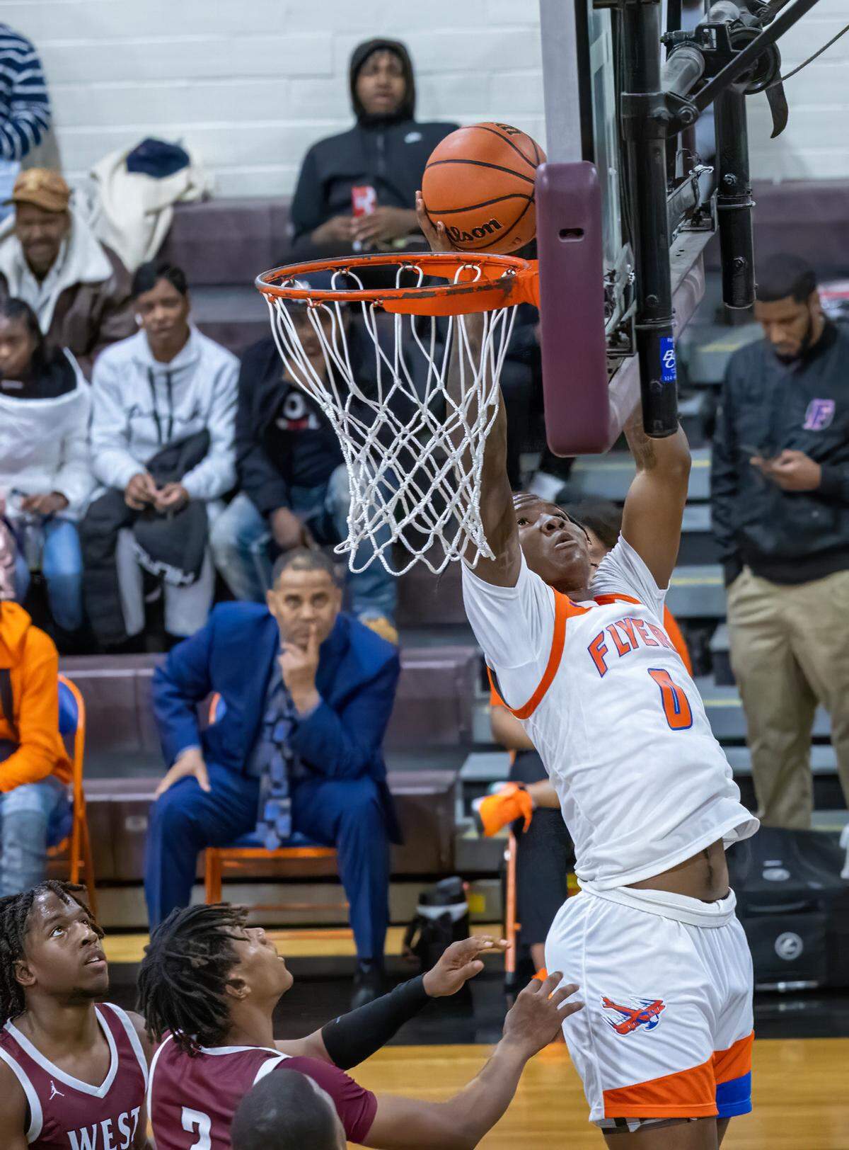 East St. Louis’ Macaleab Rich goes up for a lay-up against Belleville West during Friday night’s Southwestern Conference game. The Flyers ultimately posted an 81-52 victory.