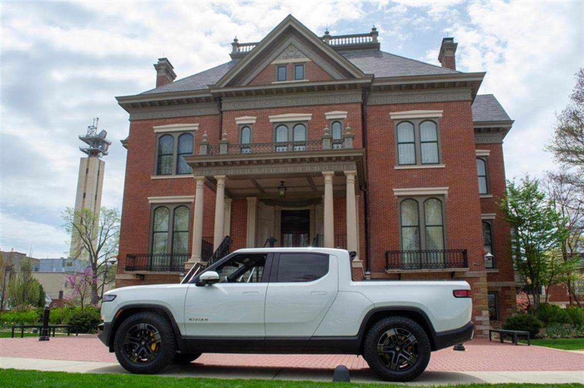 A Rivian all-electric R1T truck, manufactured in Normal, is pictured outside of the Governor’s Mansion Wednesday in Springfield. The truck won the title of the “Coolest Thing Made in Illinois” at a contest held by the Illinois Manufacturers’ Association.