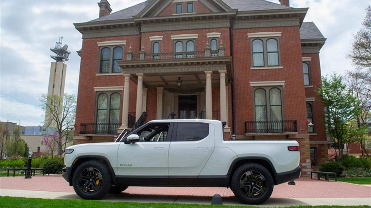 A Rivian all-electric R1T truck, manufactured in Normal, is pictured outside of the Governor’s Mansion Wednesday in Springfield. The truck won the title of the “Coolest Thing Made in Illinois” at a contest held by the Illinois Manufacturers’ Association.