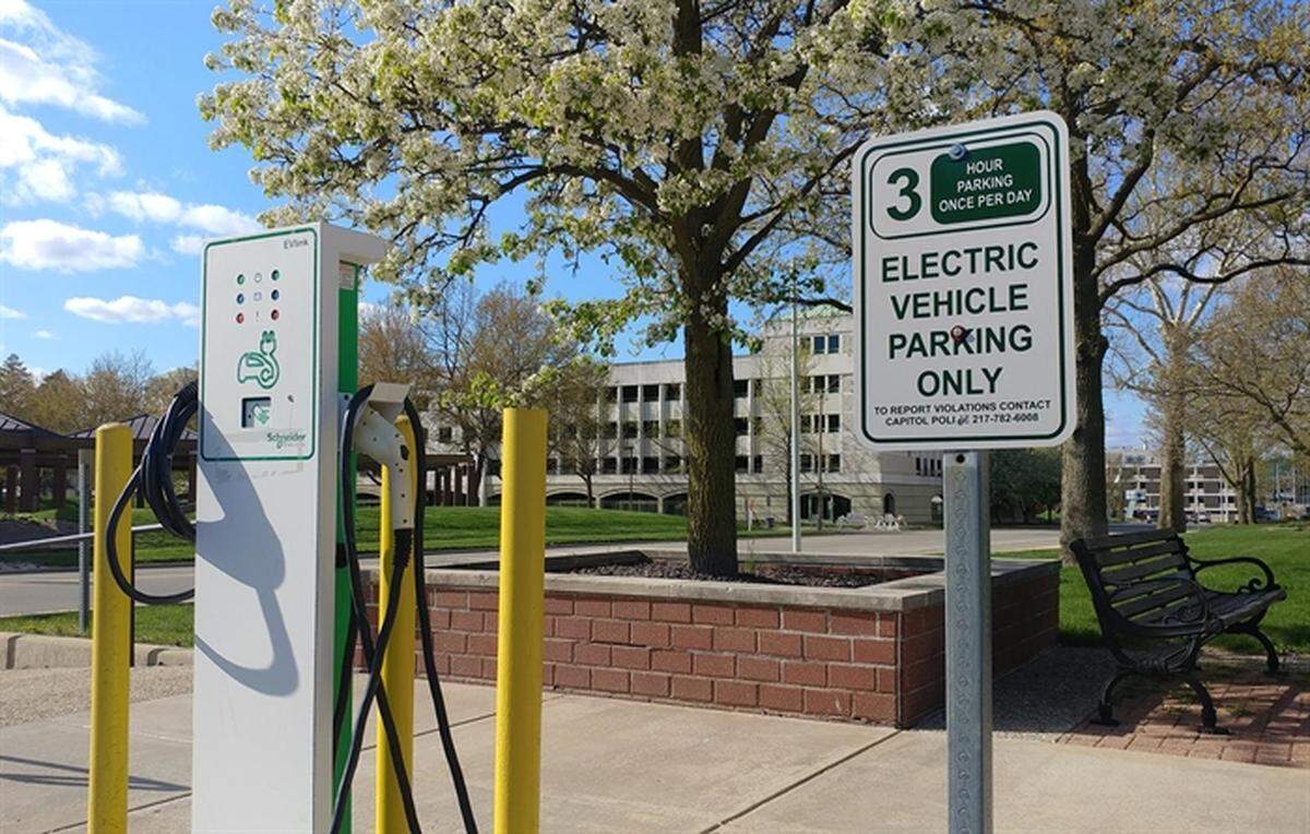 An electric vehicle charging station is pictured on the Illinois State Capitol Complex grounds. State regulators are in the process of defining several of the state’s next steps toward putting 1 million electric vehicles on state roads by 2030.