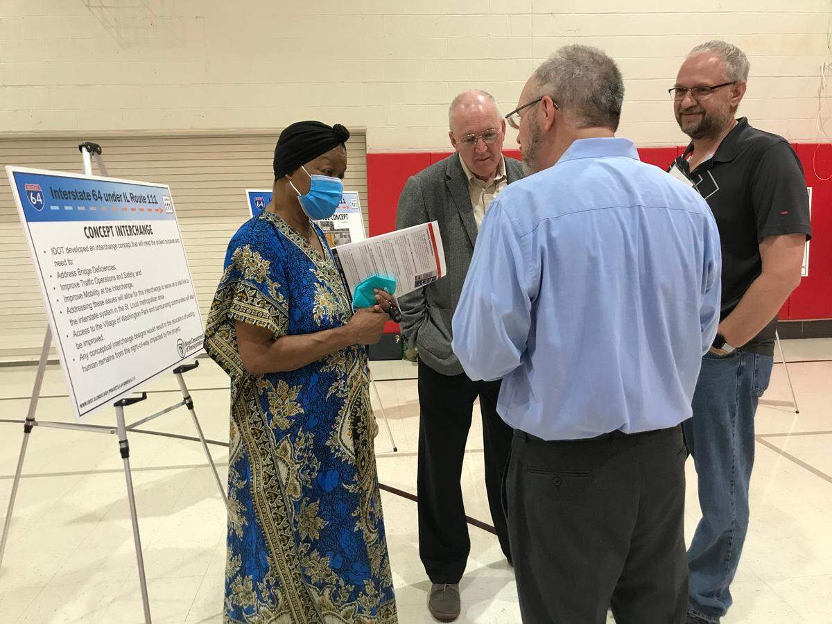 Washington Park community activist Malissa Blanchard talks with Illinois Department of Transportation officials Tuesday at James Avant Elementary School. IDOT held an open house to explain its $28.5 million plan to replace the Interstate 64 and Illinois 111 interchange.