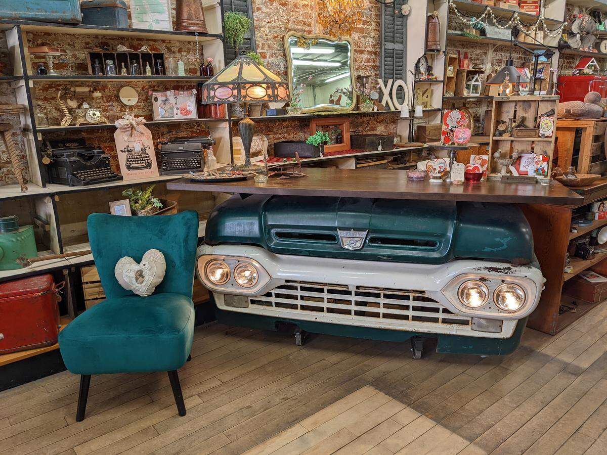 The highlight of the checkout counter at Blanquart’s Rusty Gem Vintage market is the front end of an old Ford truck.