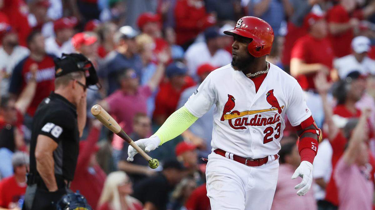 St. Louis Cardinals’ Marcell Ozuna reacts after hitting a solo home run during the fourth inning in Game 4 of a baseball National League Division Series against the Atlanta Braves, Monday, Oct. 7, 2019, in St. Louis. (AP Photo/Jeff Roberson)