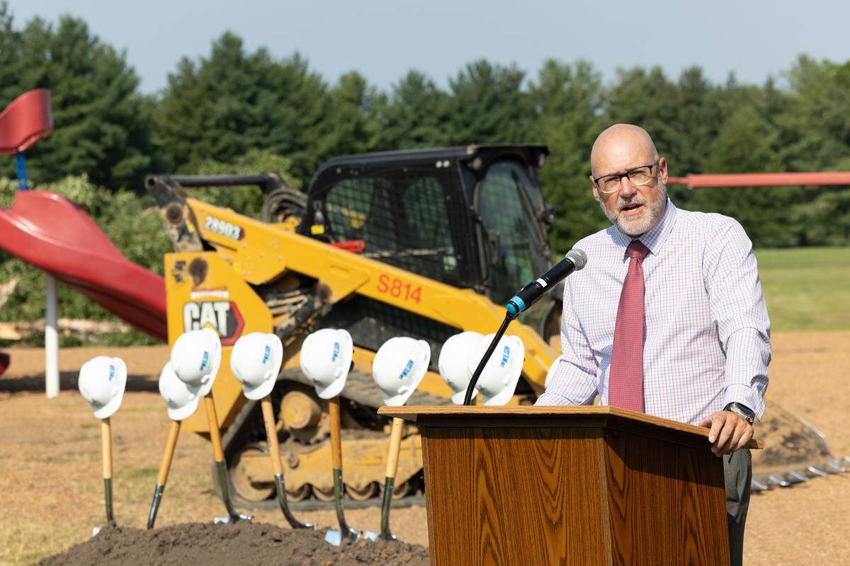 Belleville school district 115 superintendent Mark Heuring speaks to construction contractors, teachers, supporters and media during a groundbreaking ceremony at Whiteside Elementary in Belleville.