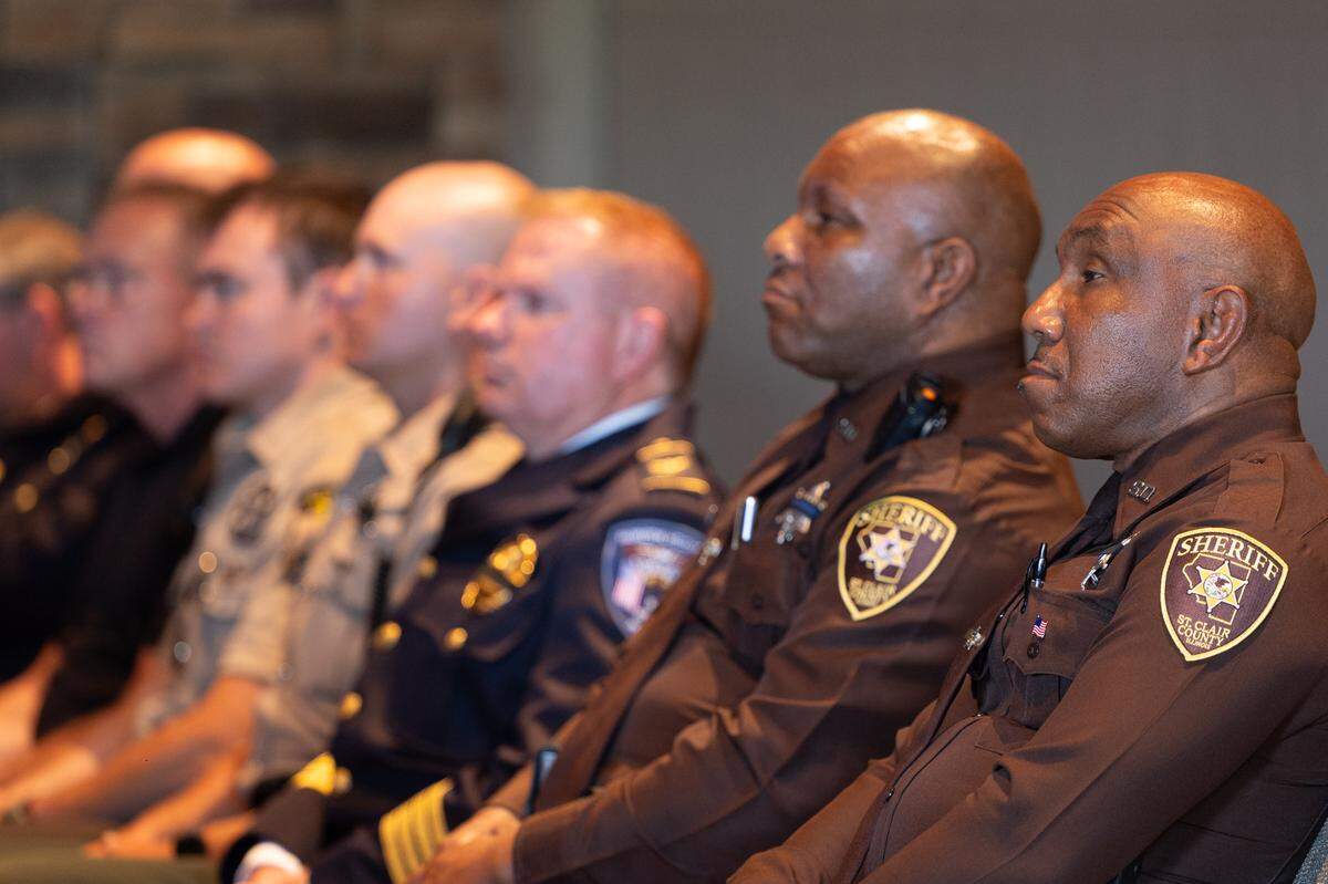 Officers from across St. Clair county filled the pews during a memorial service for fallen police officers of St. Clair County in Christ Church on Frank Scott Parkway in Fairview Heights, Ill. on May 7, 2024.