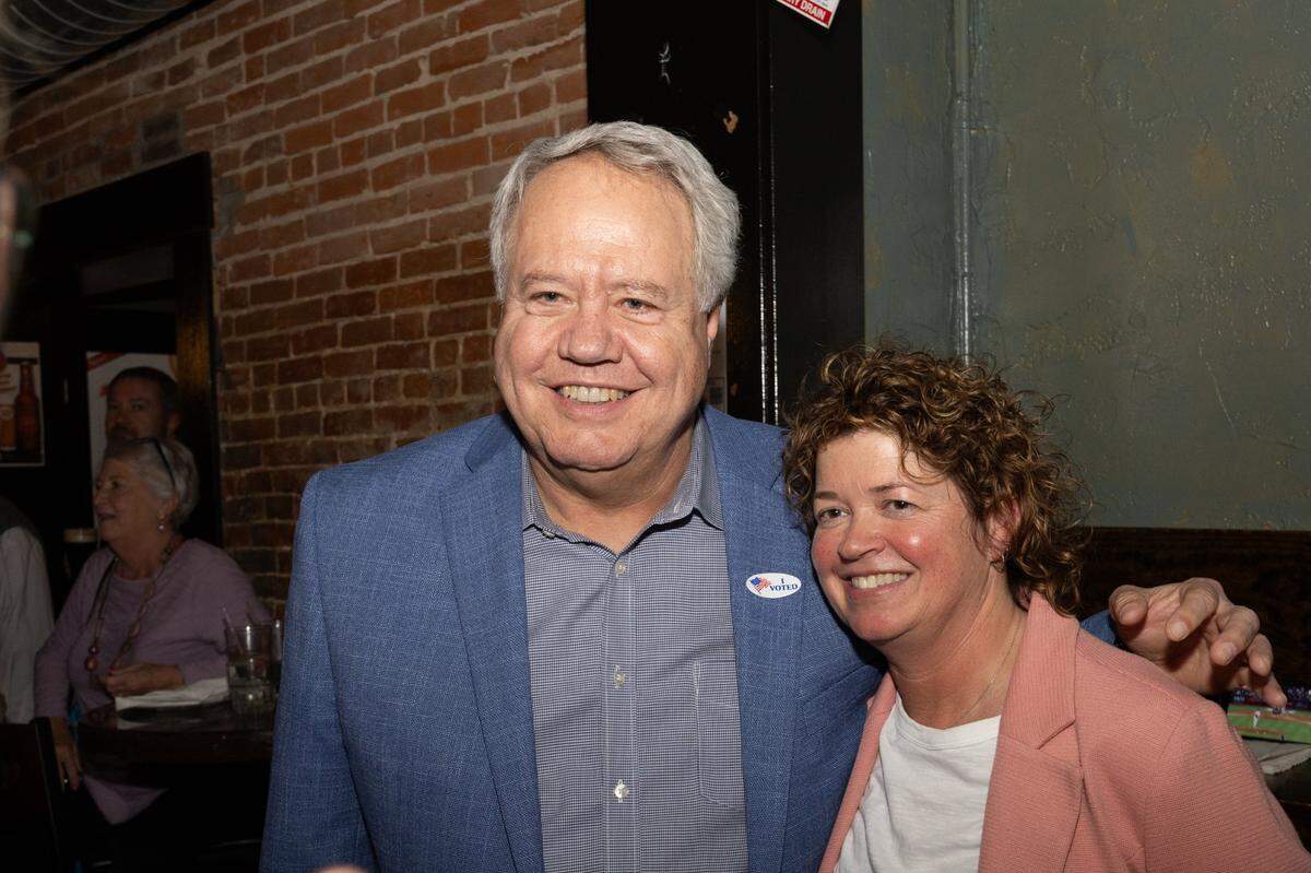 Belleville ‘s mayor-elect, Jenny Gain Meyer, hugs Illinois Rep. Jay Hoffman during an election watch party that turned into a victory celebration Tuesday night at Tavern on Main restaurant and bar.