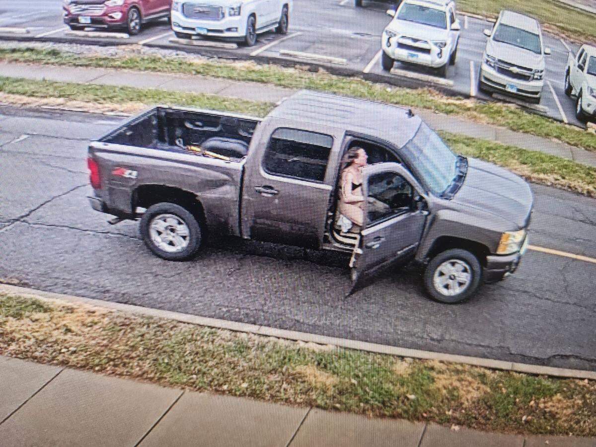 A brown pickup truck with a partially nude woman trying to escape it was captured on security camera in Mount Vernon Thursday. Police are looking to identify the truck’s owner and check on the woman’s well-being.