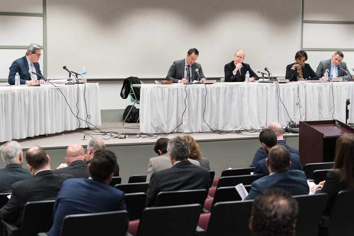 Video gambling has created a massive regulatory burden for the Illinois Gaming Board, which consists of five part-time members, while creating an $86 million funding shortfall in regulatory expenses. Here, the board meets at the Michael A. Bilandic Building in Chicago in December 2018.
