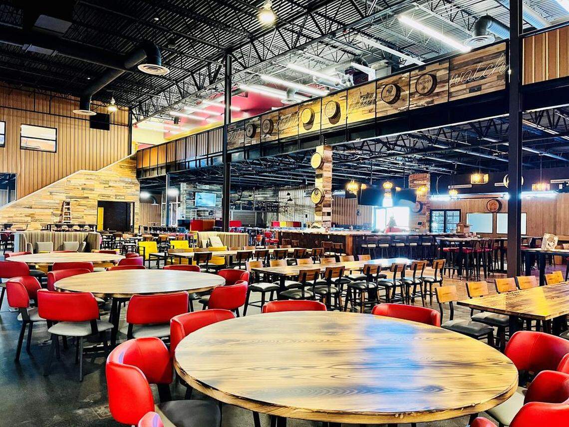 Pictured is the interior of Dogwood Social House restaurant, arcade, bowling, karaoke, and fun center for families in the renovated former Gold’s Gym at 1206 Central Park Drive. The restaurant and bar take up 36,825 square feet while the remaining 3,670 square feet will be a package liquor store with a separate entrance.