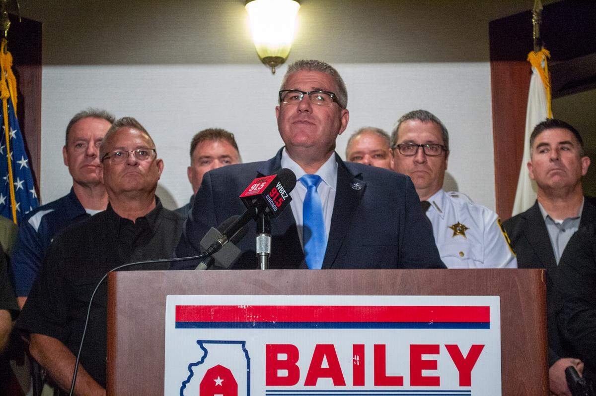 State Sen. Darren Bailey urges a full repeal of the SAFE-T Act criminal justice reform at a news conference with county sheriffs earlier this month.