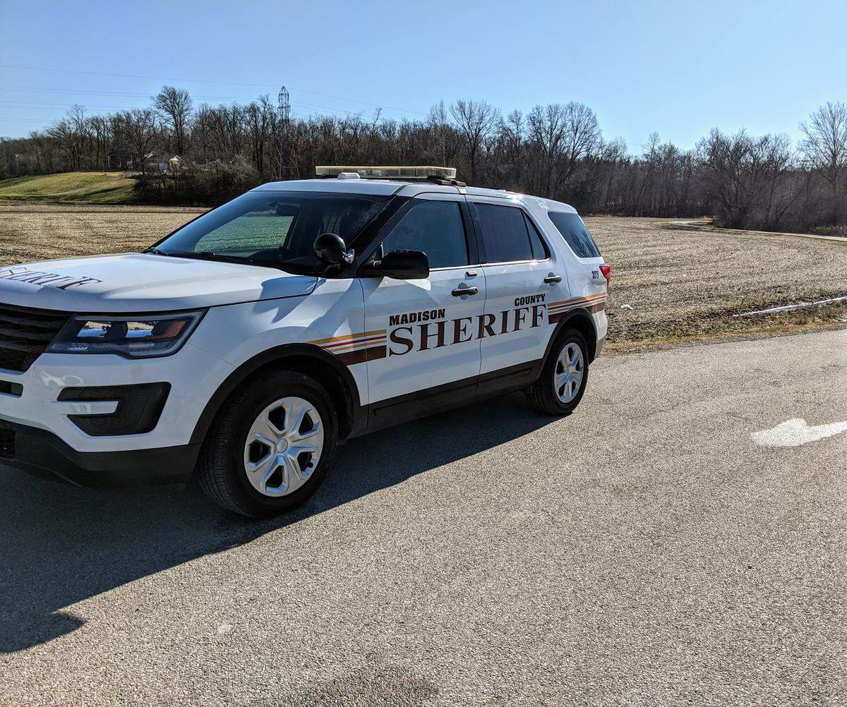 A Madison County Sheriff’s Department vehicle blocks the road leading to Edwardsville attorney Randy Gori’s home on Sunday. The Major Case Squad of Greater St. Louis has been investigating since he was found murdered Saturday night.