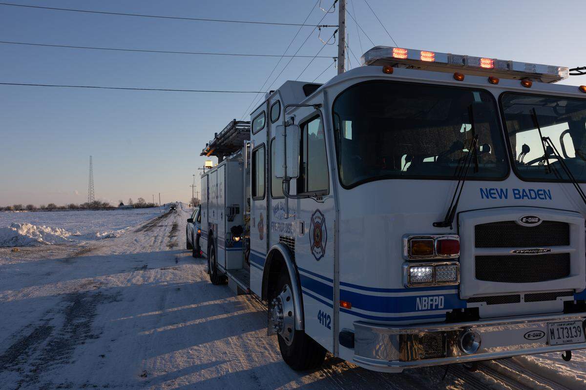 Along Clinton County Line Road, where multiple emergency service agencies joined forces for an aquatic rescue south of New Baden on Monday afternoon.
