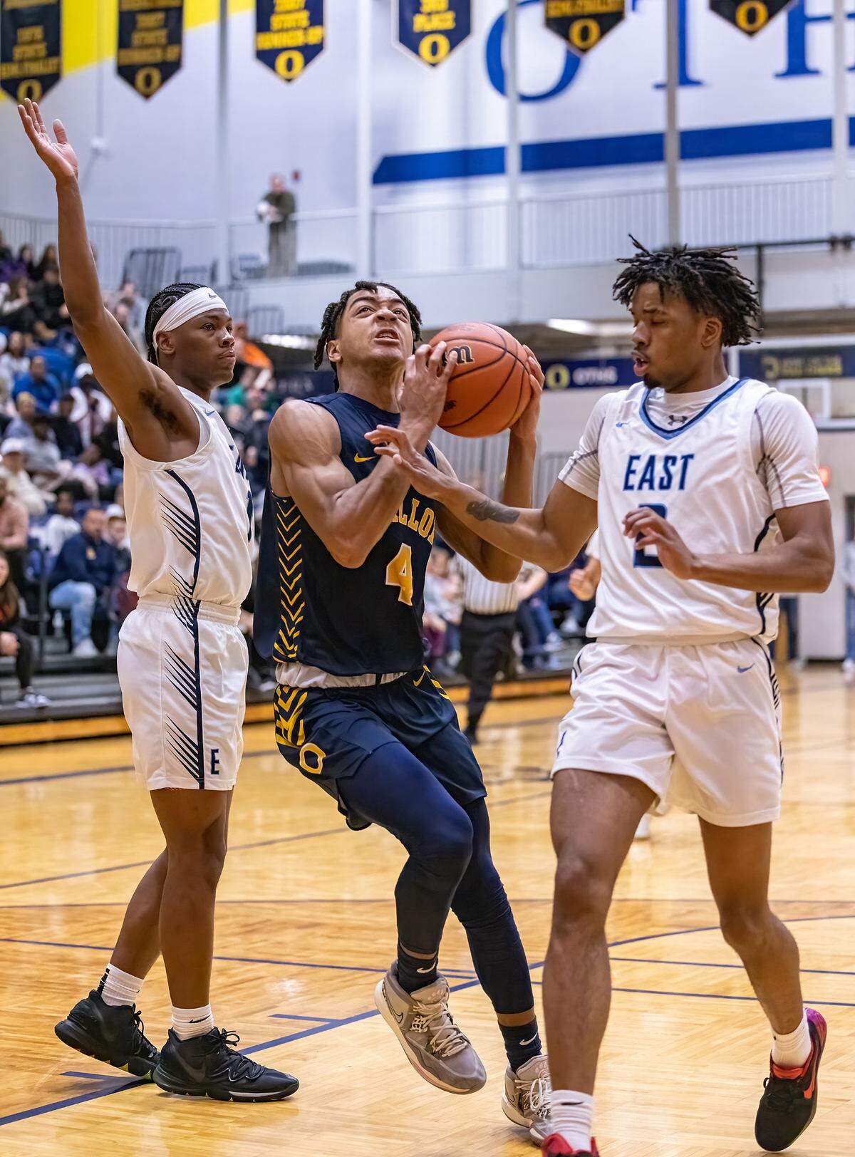 O’Fallon’s Jalen Smith goes to the basket during Friday night’s IHSA Class 4A regional championship game. The Panthers ultimately prevailed 52-50.