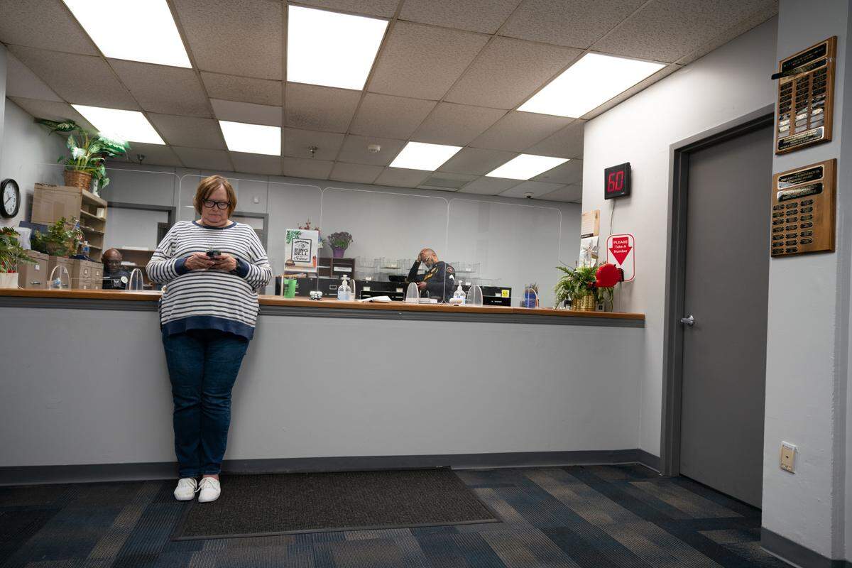 Deb Detmers, a member of the Republican Poll Watchers, waits inside of East St. Louis’ City Hall at 10:30 p.m. on Nov. 5, 2024, for results from East St. Louis voters. “We just want to make sure everything is fair,” Detmers said.
