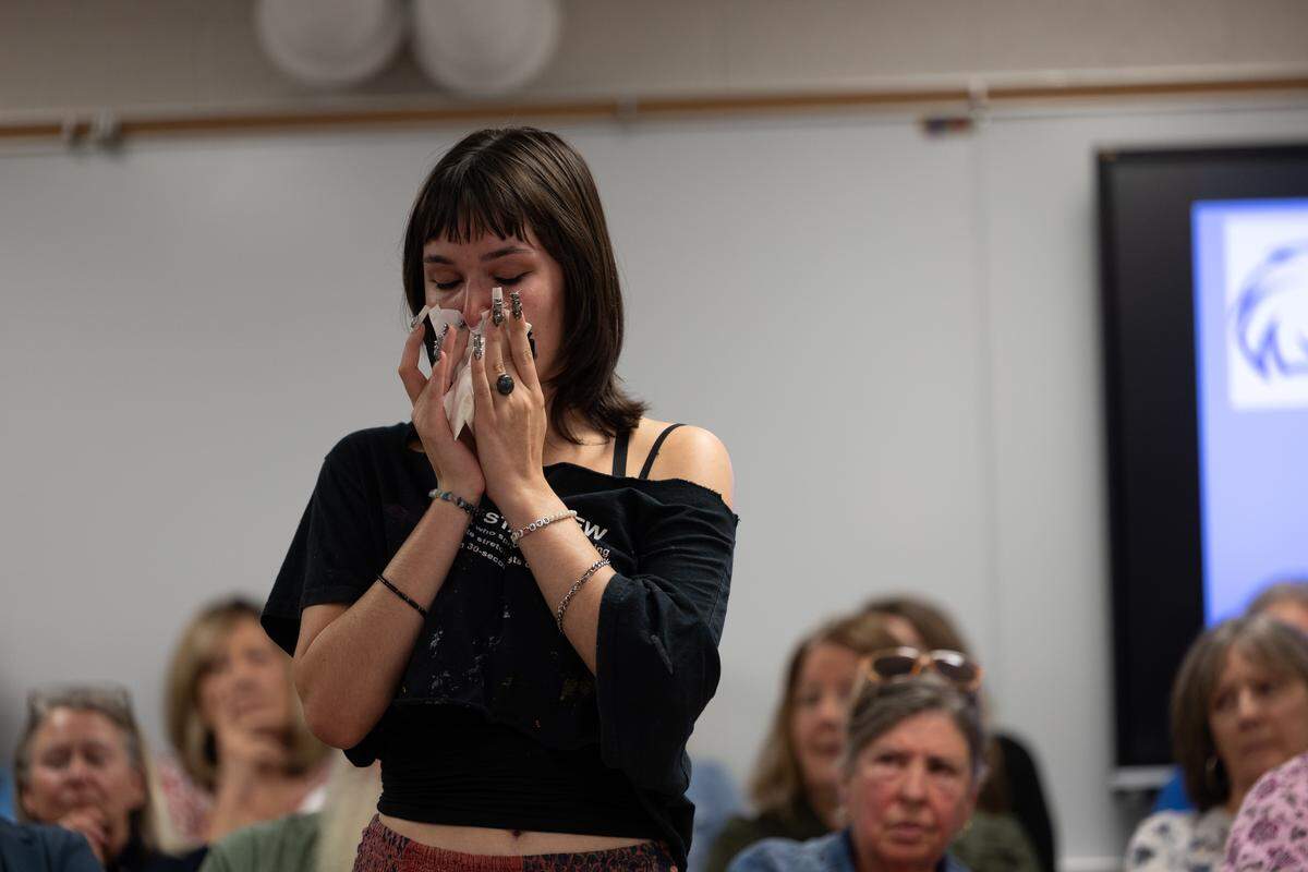Kaelyn O’Brien, a Columbia High School graduate, is overcome with emotion when describing high school English teacher Mary Adams, who resigned after her alleged social media post about recently-slain Charlie Kirk went public and she became the target of what speakers described as a bullying campaign.