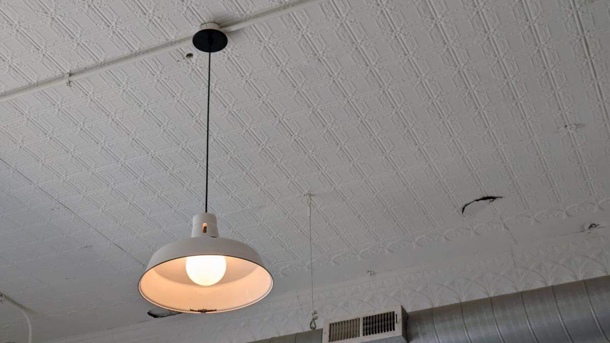 This light fixture, from an old firehouse, is one of the details acknowledging Edwardsville’s history at Ed’s Delicatessen on North Main Street.