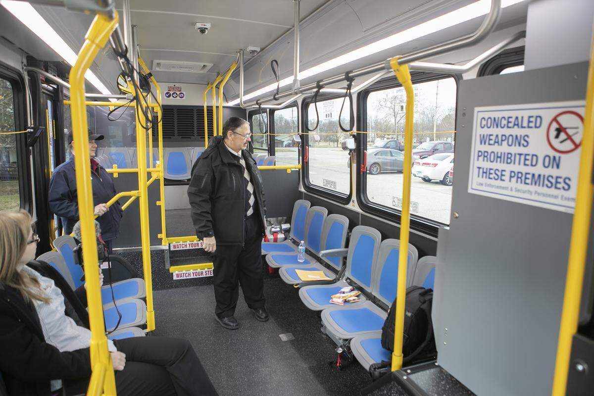 Herb Simmons, chair of St. Clair County Transit District Board of Trustees, tours one of five new buses that is being added to the SCCTD fleet. The new 29-foot buses are smaller, more fuel-efficient, have a protective driver barrier, wheelchair ramps versus hydralic lifts and improved security surveillance. The smaller buses will help drivers navigate narrow streets and decrease their turning radius from 43 feet to 29 feet. “The new buses will help meet the evolving needs of our ridership, while saving energy and money and providing a smoother, safer ride,” said Herb Simmons.