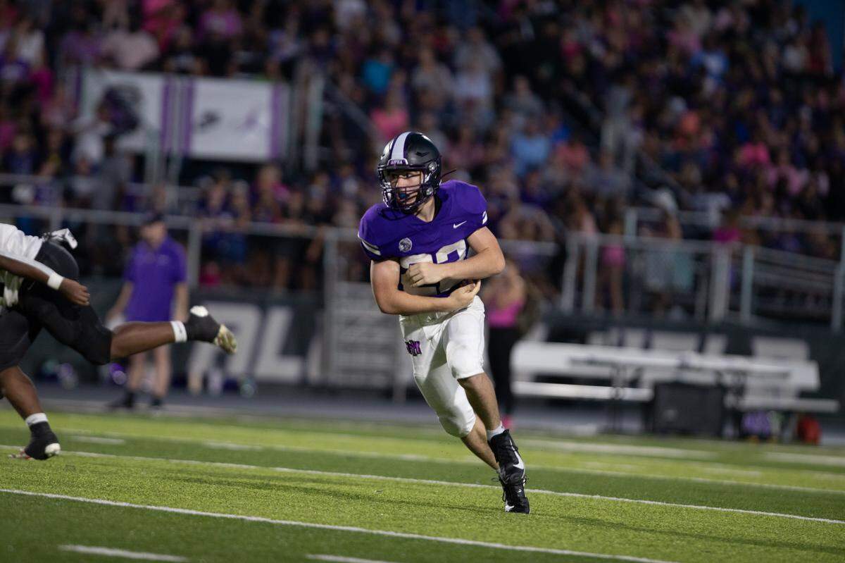 Mascoutah’s Sean Murphy carries the ball during the first game of the season against Belleville West on Aug. 30, 2024.