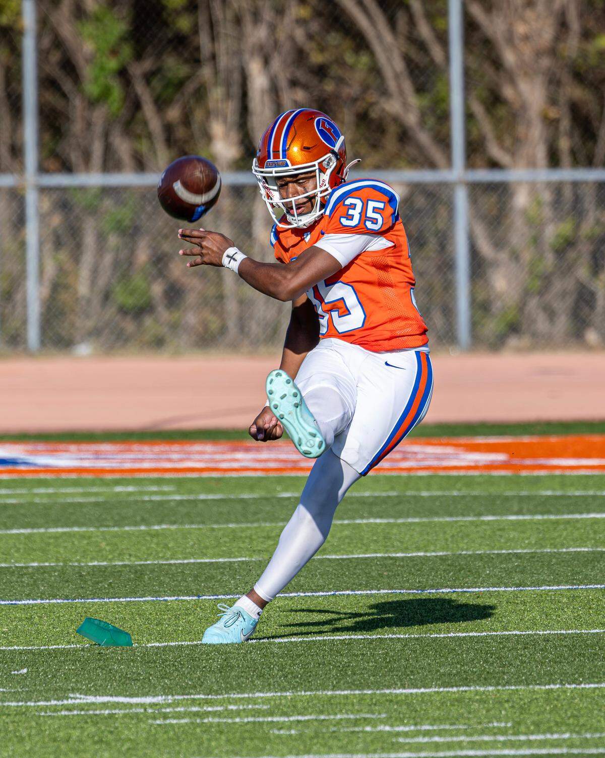 East St. Louis junior Damon Pruitt kicks off to Chicago Simeon in the IHSA Class 6A football playoff quarterfinal game Saturday.